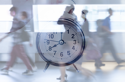 abstract, layered photo images with blurred people in background and clock face in foreground