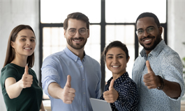 employees giving "thumbs-up" 